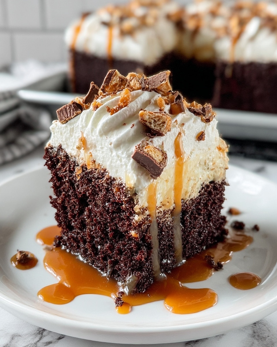 A close-up view of a rich, dark brown chocolate cake slice with a moist and slightly shiny texture, topped with a thick layer of fluffy white whipped cream. The whipped cream is drizzled with golden caramel sauce and sprinkled with small pieces of chopped nuts and chocolate bits. The cake sits on a white plate with a few caramel drizzles around it, and in the background, a white baking dish holds the rest of the cake. The surface beneath is a white marbled texture. Photo taken with an iphone --ar 4:5 --v 7